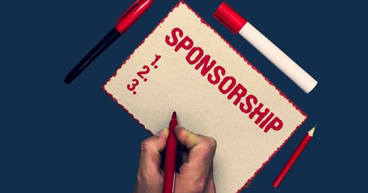 hand holding red pen about to write on piece of paper that has written on it in red writing - Sponsorship with a list under it 1.