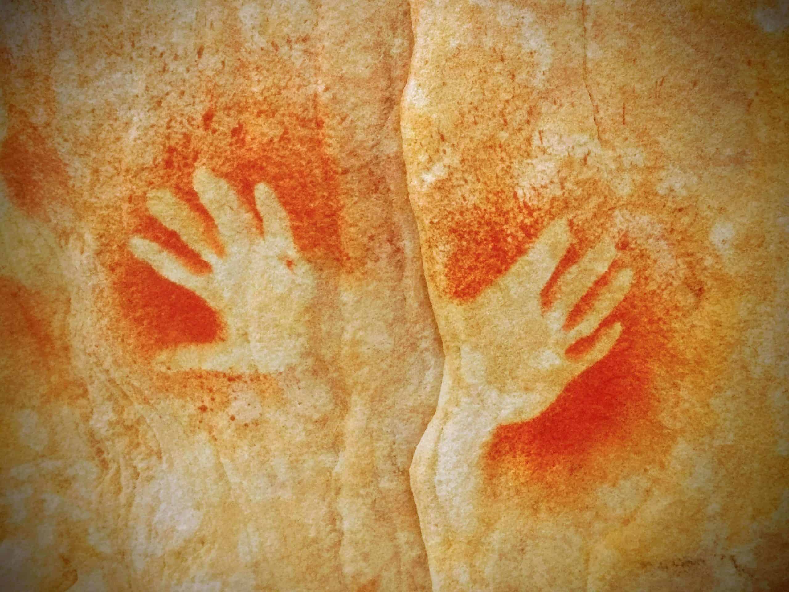Australian Aboriginal hand painting in cave in Sydney|portrait of Archie Roach on cover of his biography - Tell my why|portrait of Jack Charles on front of book cover|portrait of Anita Heiss on the cover her book - Am I black enough for you?|a portrait of Charlie Perkins on the front of his book 'A bastard like me'