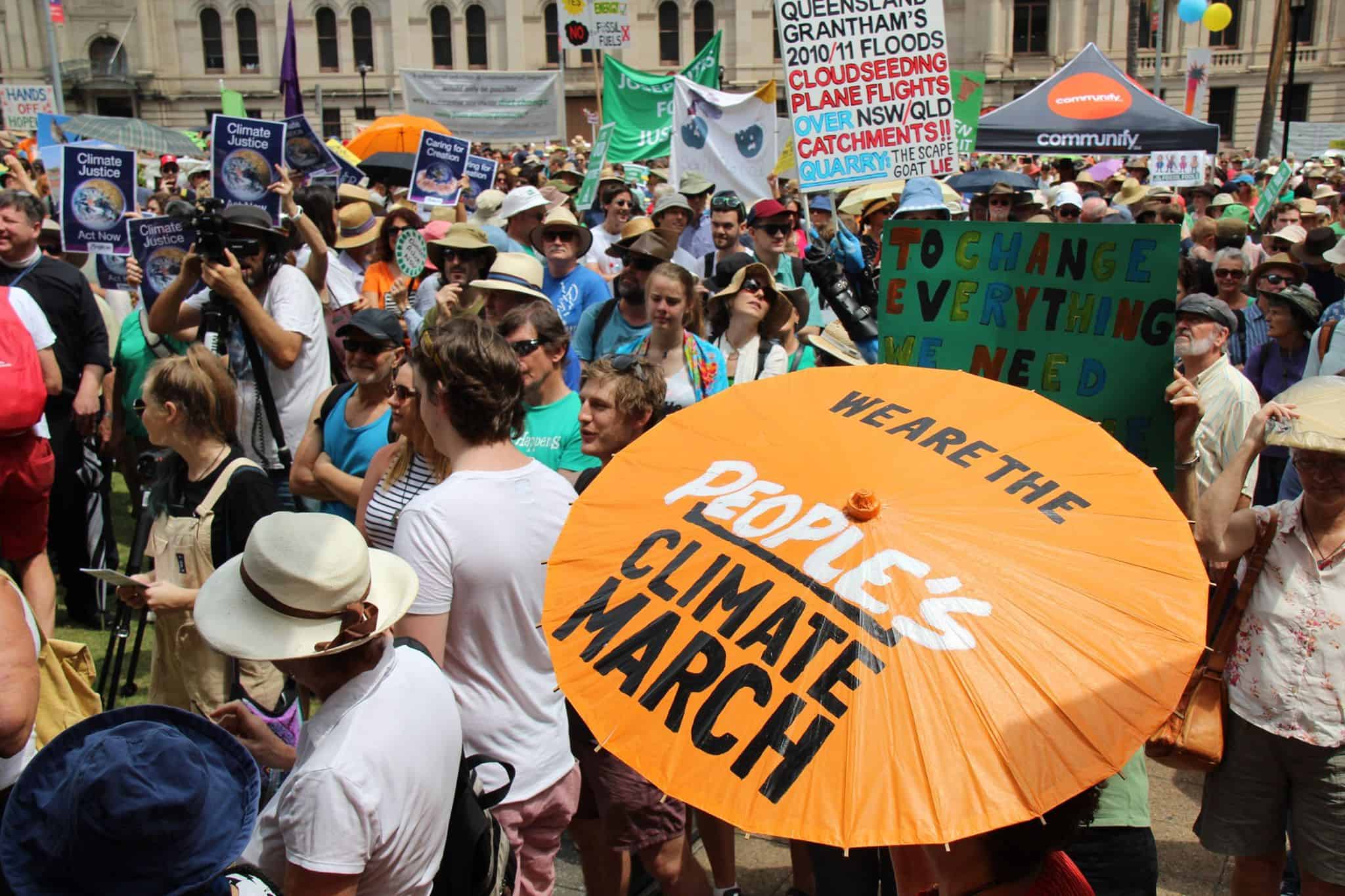 people at climate change march with person holding orange parasol with words "we are the people's climate march"|parasol designed for climate change protest|parasol designed for climate change protest|parasol designed for climate change protest|parasol designed for climate change protest|parasol designed for climate change protest|parasol designed for climate change protest|parasol designed for climate change protest|parasol designed for climate change protest|parasol designed for climate change protest