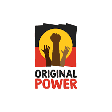 Original Power logo: 3 hands held up (one in a clenched fist) against the backdrop of the Aboriginal flag.