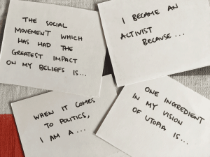 Cards read: 'The social movement that has had the biggest impact on me...', 'I became an activist because...', 'When it comes to politics Iam a...', 'One ingredient in my vision of utopia is...'