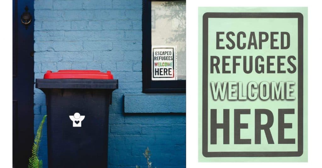 posters saying Escape Refugees Welcome Here