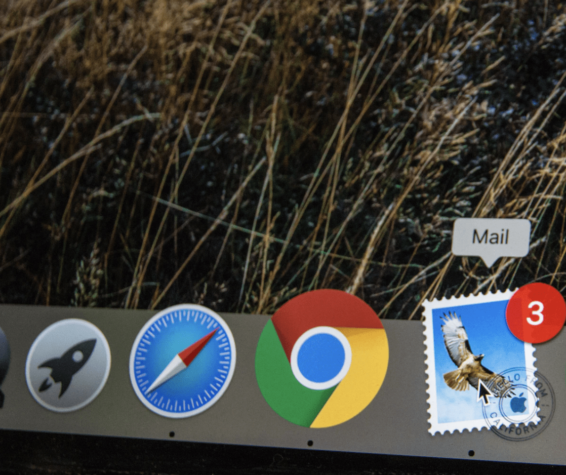close up of icons on computer screen with focus on email icon||
