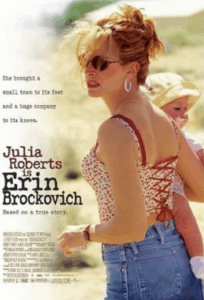 DVD cover for movie Erin Brockovich - a mother holding a baby on her hip