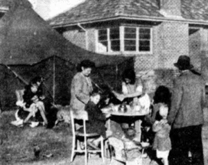 Family camping outside the Ashfield home from which they had been evicted, 1946
