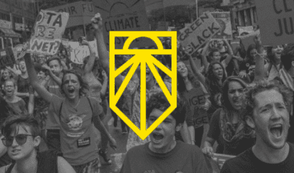 A black and white photo of people at a protest with a yellow logo of a sunrise, representing the Sunrise Movement.