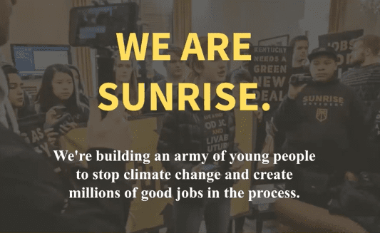 protestors on the street carrying banners. One reads Green New Deal. Text overlays the image and reads - We are Sunrise. We're building an army of young people to stop climate change and create millions of good jobs in the process.