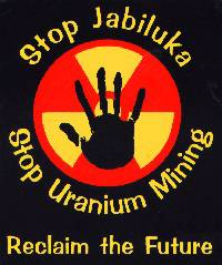 Stop Jabiluka, Stop Uranium Mining, Reclaim the Future. Symbol of a hand print on background of a nuclear symbol.