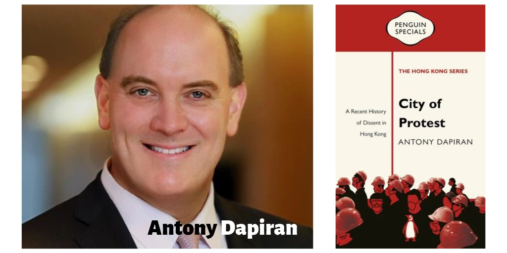 Portrait shot of a man known as Antony Dapiran. He is smiling. To the right of his photo is the cover of a book titled 'City of Protest' by 'Antony Dapiran'. On the book cover is a photo of a group of protestors.
