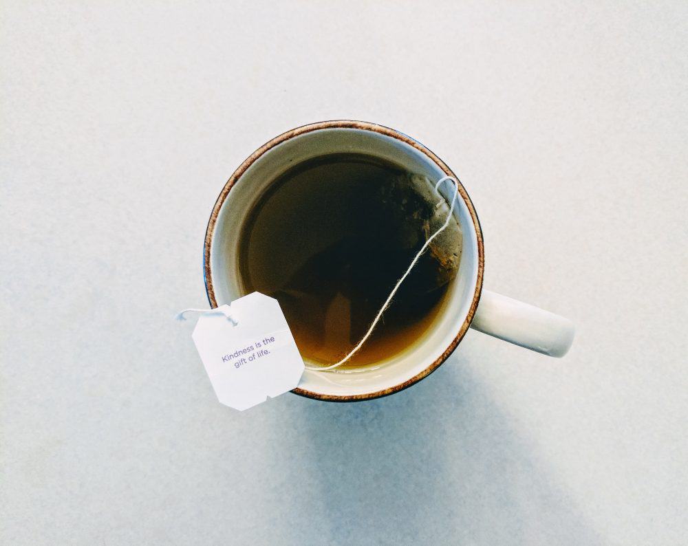 A cup of black tea on a table