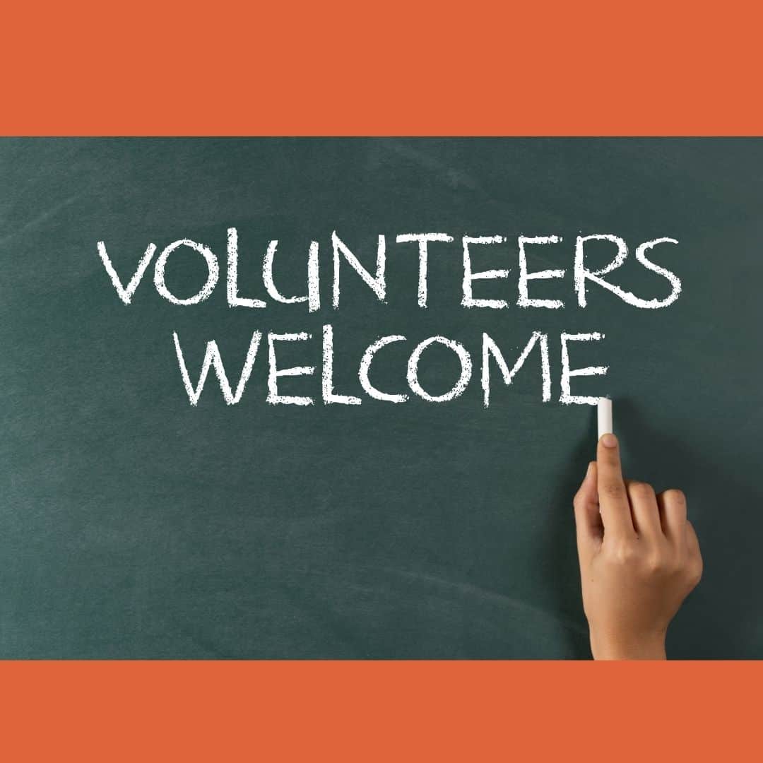 hand writing on blackboard with piece of chalk Volunteers welcome