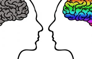 outline of two faces - facing each other. There brains are visible - one is grey and one is rainbow coloured.