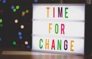 a light box with the words Time for Change in colourful letters.